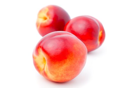 Ripe peach on a white background 