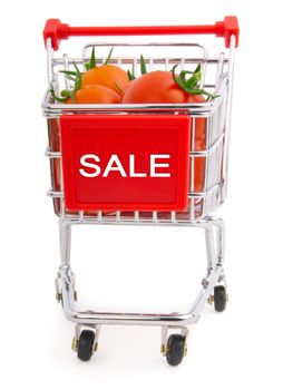 a Shopping cart full of tomatoes on a white background 