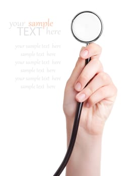 Female hand with stethoscope, with room for text. isolated on a white background 