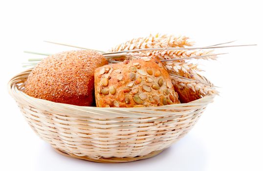 tasty baked with ears of wheat, isolated on a white background