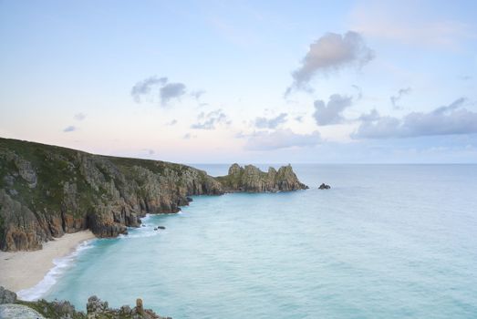 Pedn vounder beach, one of Cornwall's best beaches with stunning cliffs of Treryn Dinas, crystal clear water and a beautiful sandy beach.
 
 On a spring low tide one can walk to Pedn Vounder from neighbouring Porthcurno beach but be warned, as the tide comes in you will not only find yourself cut off but facing a climb up the steep cliff "path"
 
 The headland to the east of the beach is the location of the famous Logan Rock, a rectangular block of granite which weighs about 70 tons, and which can be rocked back and forth by one person.
 
 Pedn Vounder is an unoffical naturist beach