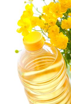 bottle of oil with flower, on a white background 