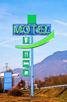 Motel sign on blue sky background. France
