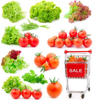 Assortment of red cherry tomatoes and lettuce leaves, isolated on white background