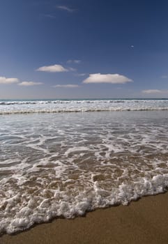 Sunny beach scene from Cornwall, UK.