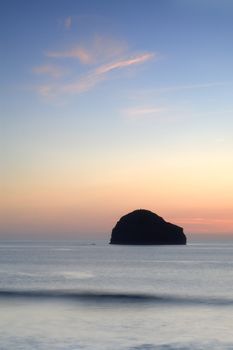 Slow shutter seascape. View from Trebarwith beach to Gull Rock, UK.