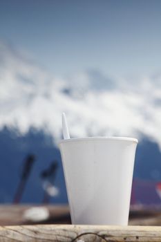 coffee in cup mountains on background