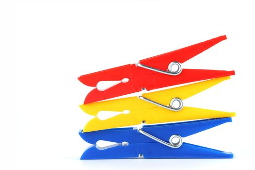 colored clothespins isolated on white background