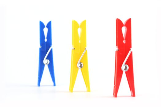 colored clothespins isolated on white background