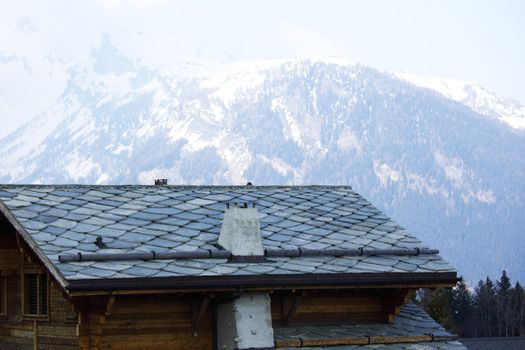 chalet in alpine mountains