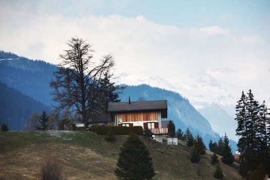 chalet in alpine mountains