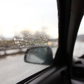 drive on rain window in drops