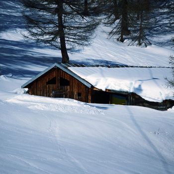 chalet in alpine mountains