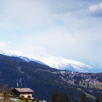 chalet in alpine mountains