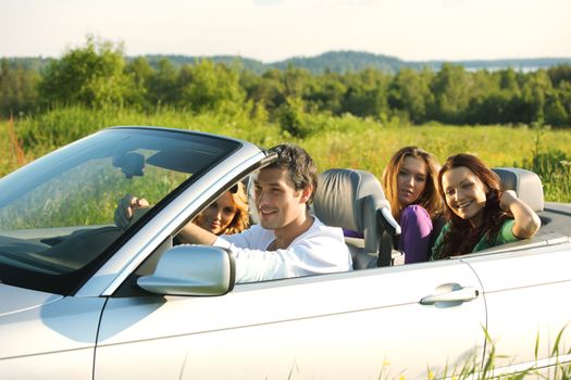 friends group in cabriolet go travel