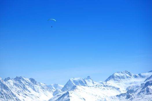 top of mountains sun in blue sky