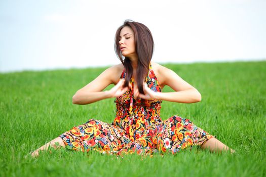 happy woman on green grass 