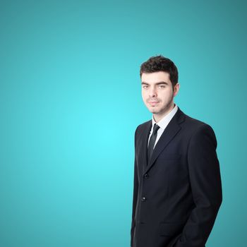 portrait of elegant businessman on blue background