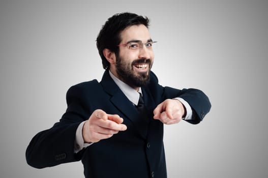 success business man pointing on gray background