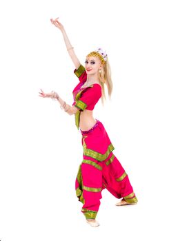 full length portrait of indian woman dancing in studio.  Isolated on white background.