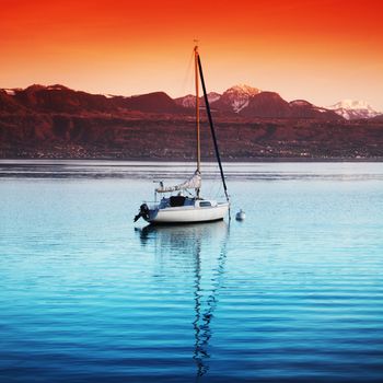 yacht in lake of geneva landscape on sunrise
