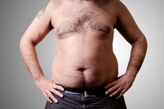 belly fat man on gray background