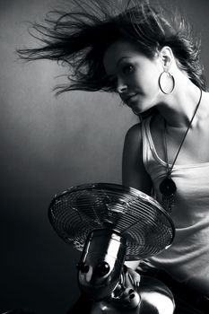 girl with fan studio portrait