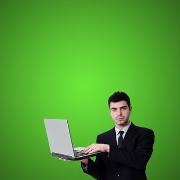 business man with notebook on green background