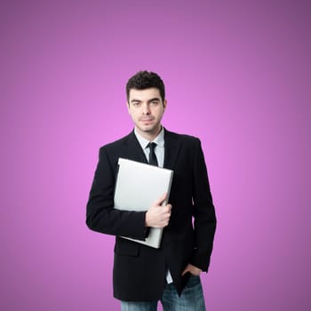 business man with notebook on pink background
