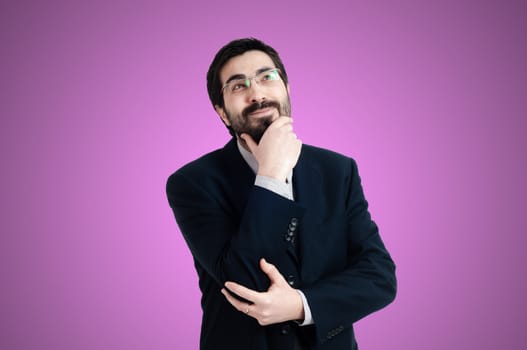 doubtful businessman on pink background