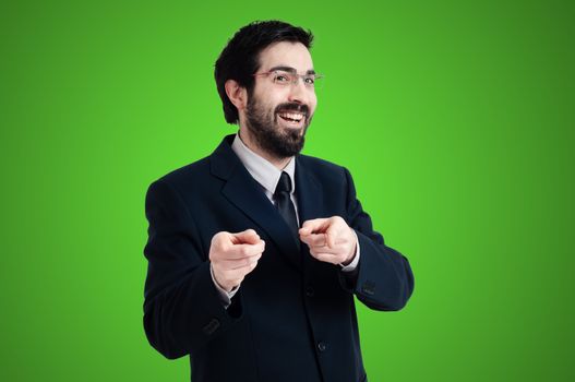 success business man pointing on green background