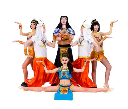 dance team dressed in Egyptian costumes posing.  Isolated on white background in full length.