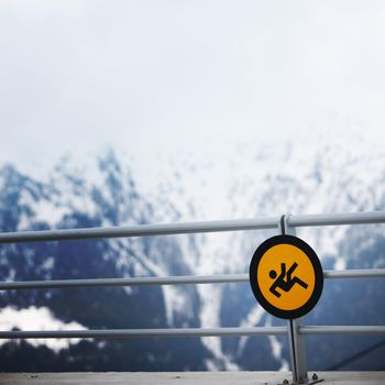 sign mountains sun in blue sky