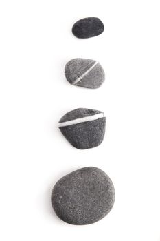 Four beautiful Spa stones isolated on white background