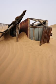 Decaying architecture at Kolmanskop near Luderitz in Namibia