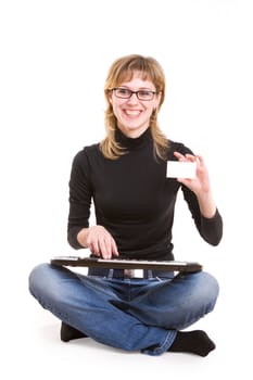 a girl with a keyboard and a card for text in her hand