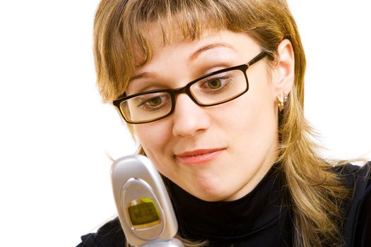 girl in glasses looking at the phone