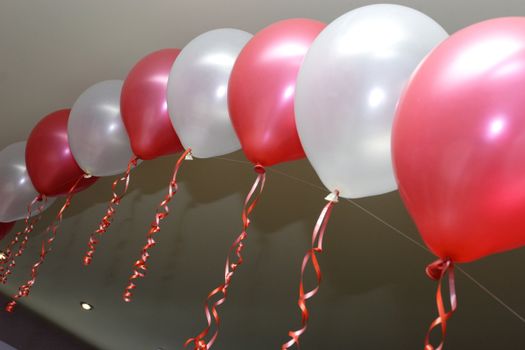 white and red baloons