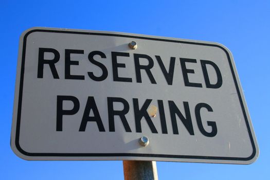 Reserved parking road sign close up.
