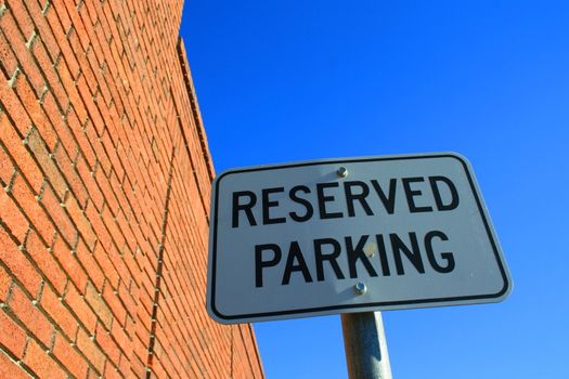 Reserved parking road sign close up.
