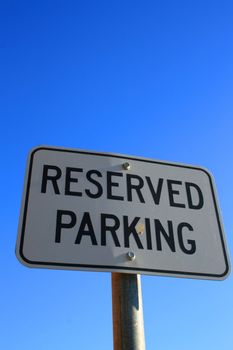 Reserved parking road sign close up.
