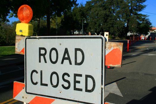 Road closed road sign close up.
