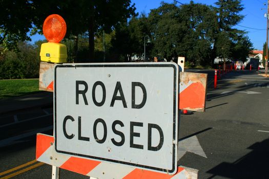 Road closed road sign close up.
