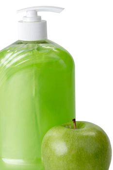 A soap pump with green apple and  soapisolated on white background.
