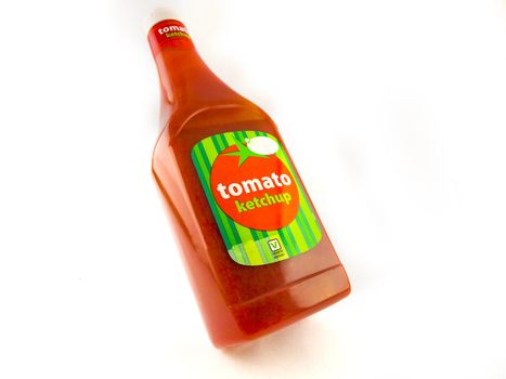 Large Bottle of Tomato Ketchup on White Background