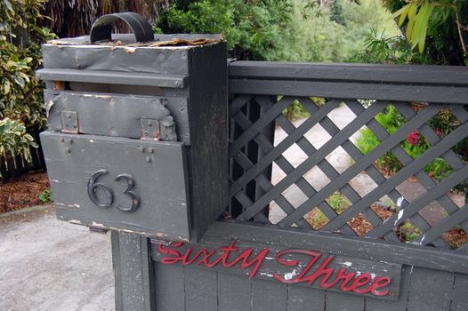 Old timber vintage mailbox rural area, Waiheke Island, New Zealand