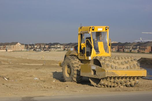 Truck, new houses and house's construction sites