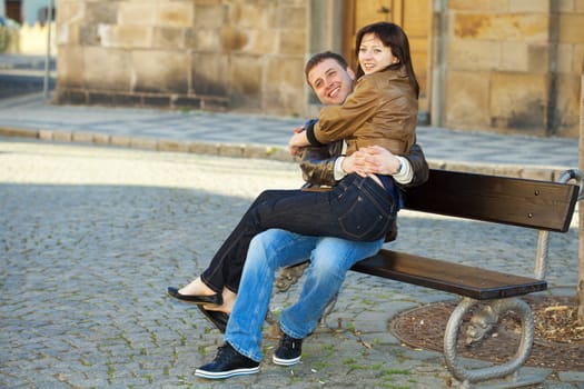 love couple sitting on the bench