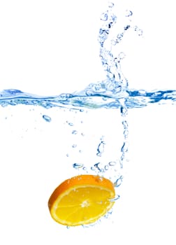 Fresh orange dropped into water with splash isolated on white