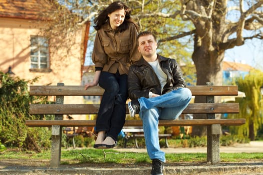 love couple sitting on a bench